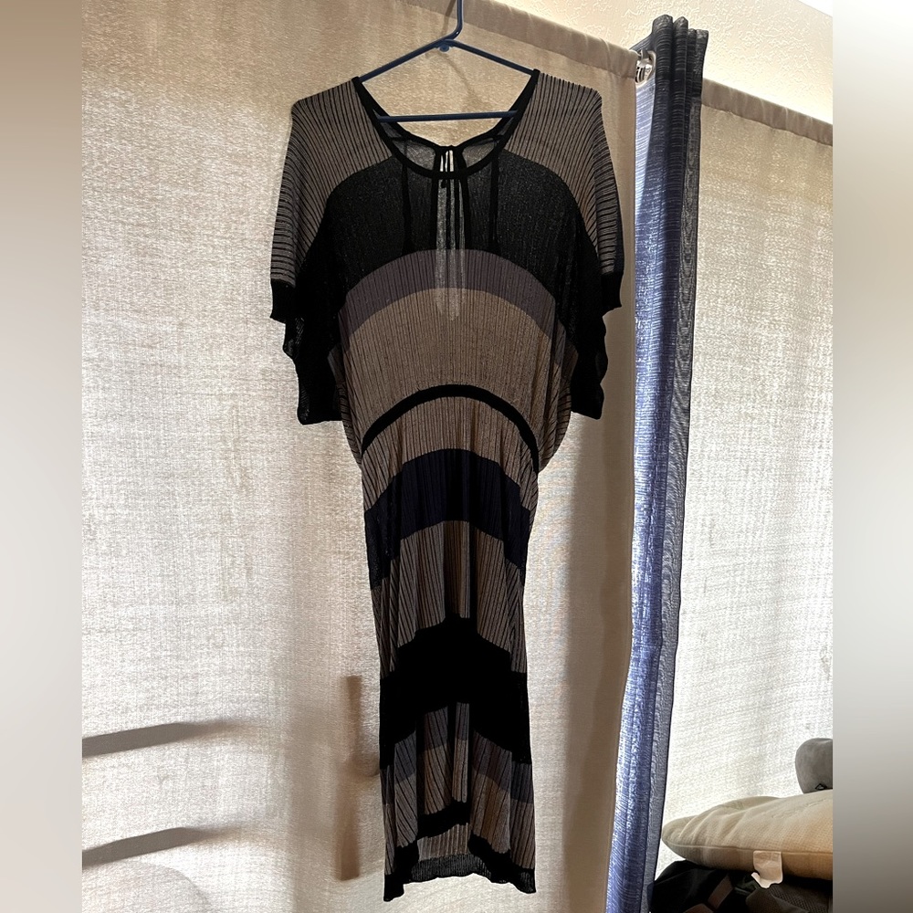 Sleek dress in a size small by Guess